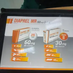 Na ekranie tabletu widoczna jest reklama leku DIAPREL MR z gliklazydem, prezentująca różne dawki i ceny.