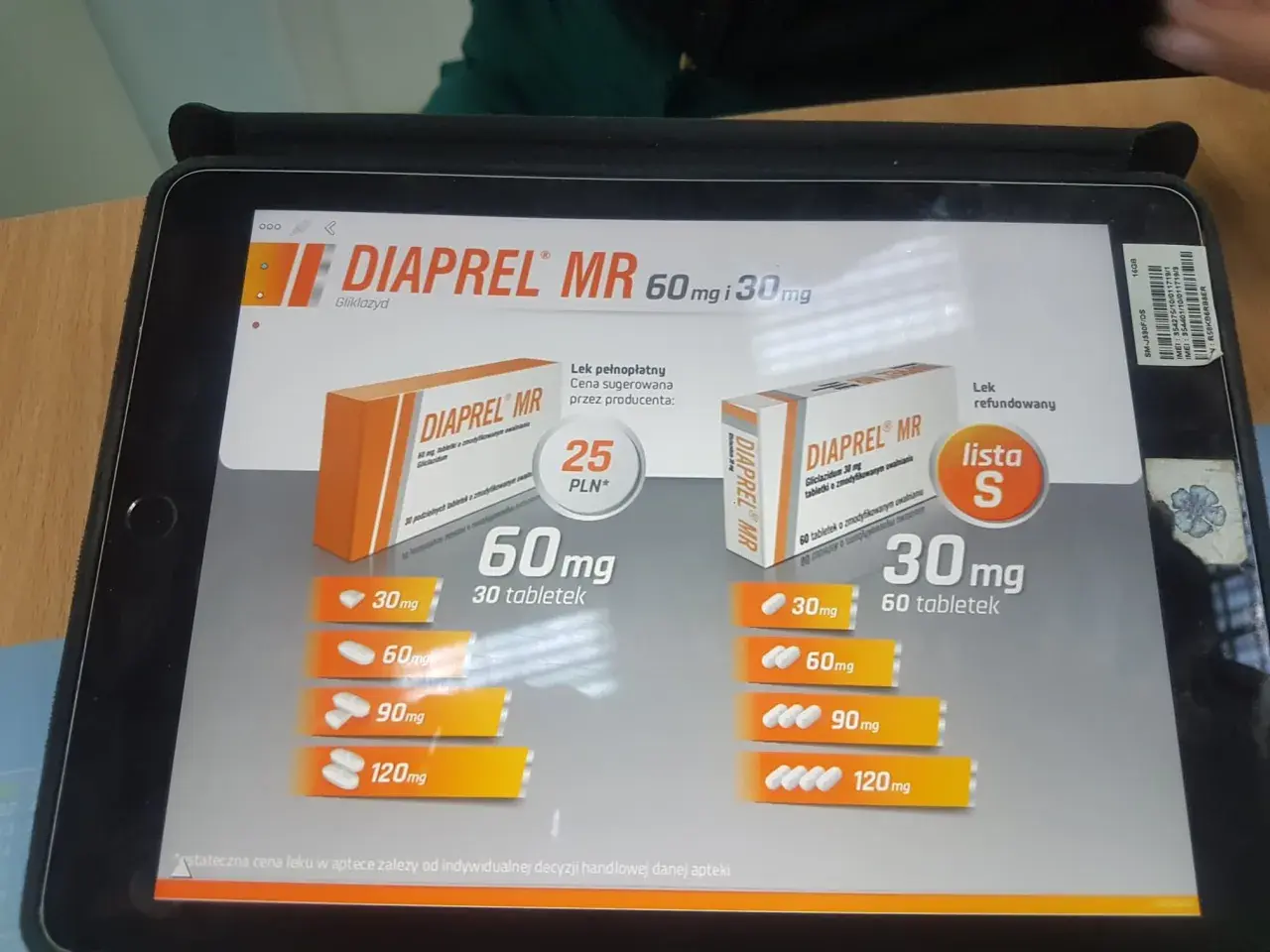 Na ekranie tabletu widoczna jest reklama leku DIAPREL MR z gliklazydem, prezentująca różne dawki i ceny.